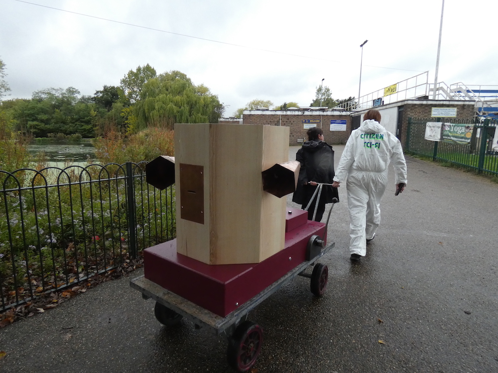 The Future Machine being pulled up to the athletics track by Rachel Jacobs and Ruth Catlow in Finsbury Park