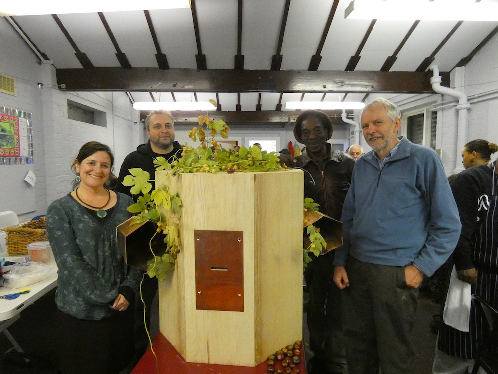 Rachel Jacobs, Dominic Price, Alex Dayo and John King and the Future Machine covered in hops in Furtherfield Commons.