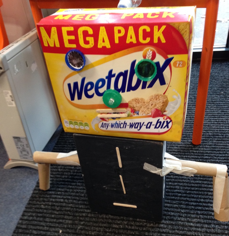 A Future Machine made by children from Mellers Primary out of cardboard and bottle tops
