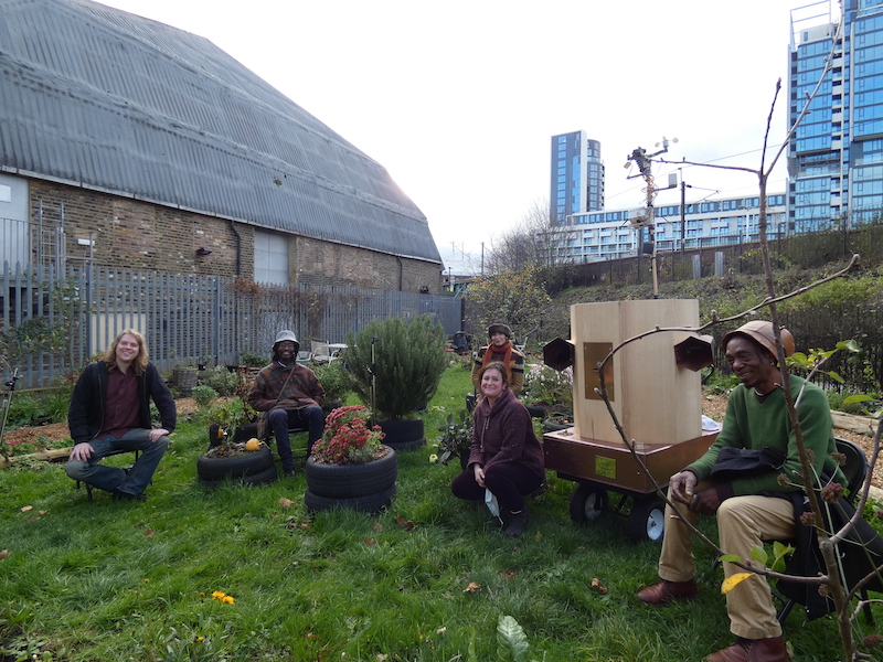 sitting in the drumming school garden from left to right David Kemp, Miles Ncube, Indira Lemouchi, Rachel Jacobs, the Future Machine, Alex Dayo