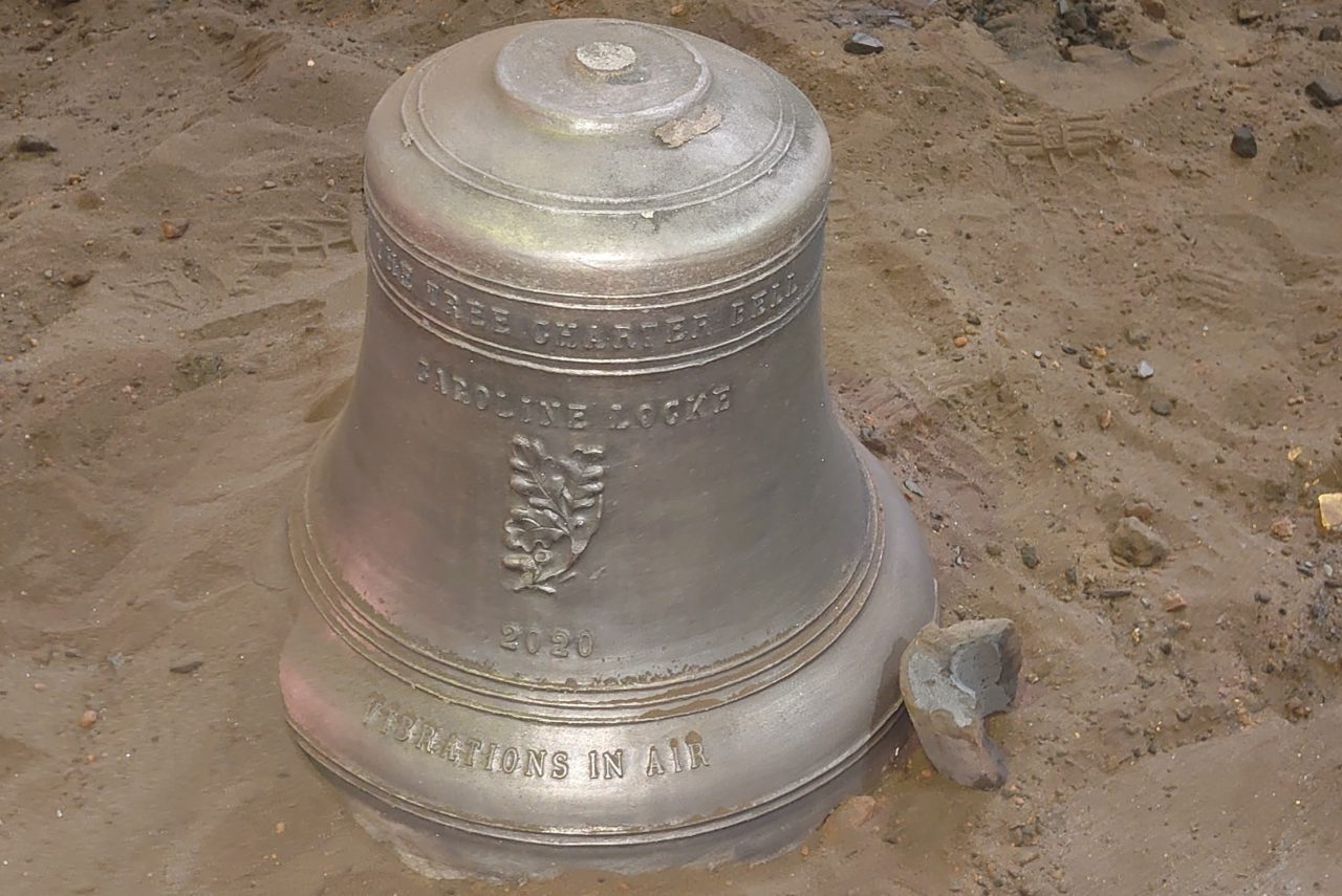 Caroline Locke's Tree Charter Bell - with Vibrations in Air engraved on it.