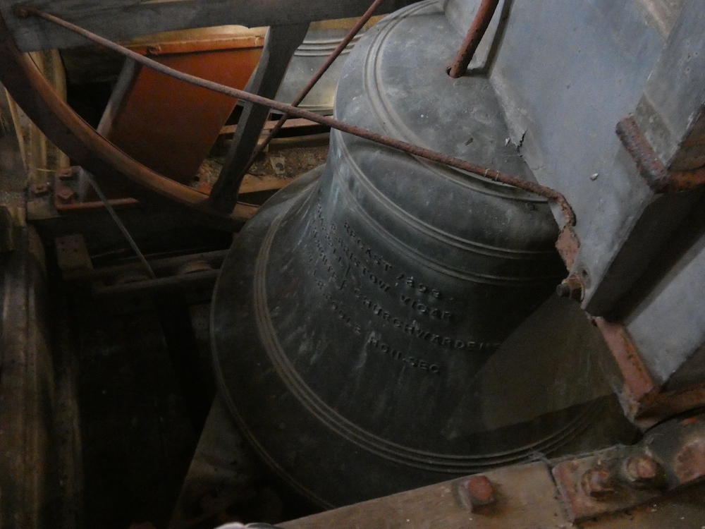 one of the bells in the tower
