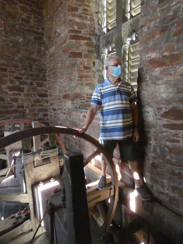 Mike standing on the bell frame in the tower