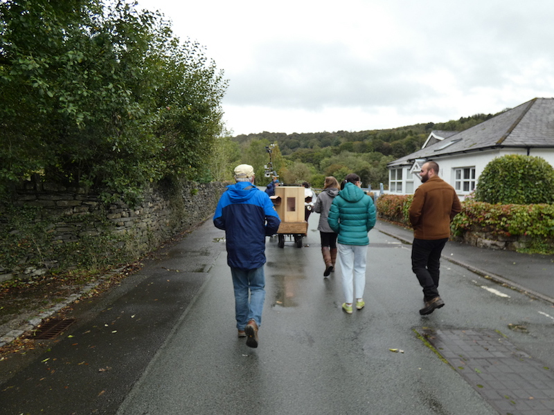 Future Machine leading a walk down to the River Leven, people, Future Machine, road, trees