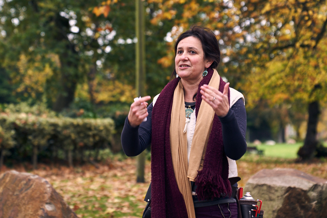 Rachel Jacobs introducing the project with Autumn trees in the background