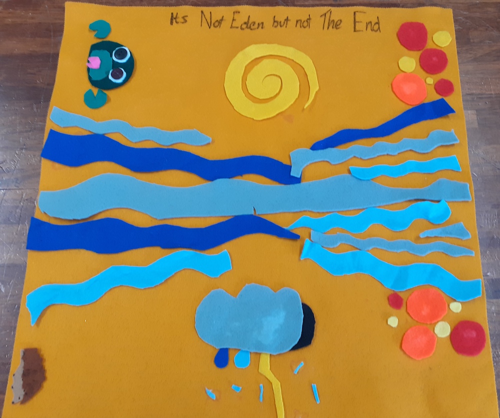 Felt Data Map titled It's Not Eden But Not The End with water, sun, storm clouds and a frog