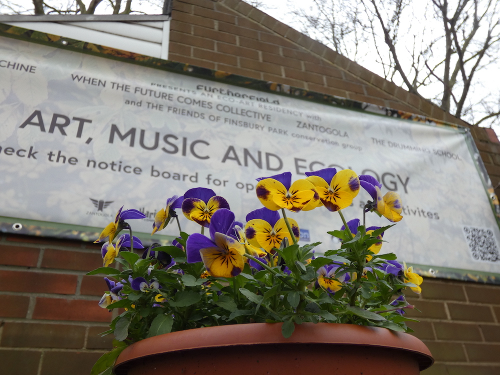 flowers and the Residency banner in the background