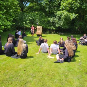 Future Machine, Rachel and the pupils in the field with trees behind