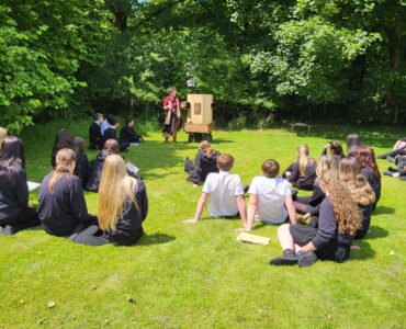 Future Machine, Rachel and the pupils in the field with trees behind