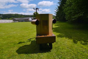 Future Machine in the rugby field with The Lakes School behind