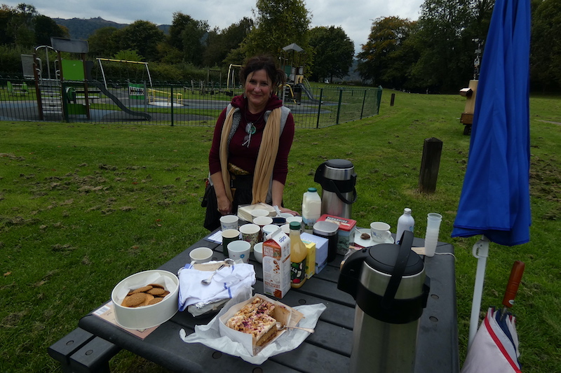 Future Machine's companion with teas, coffee and cake on the picnic bench