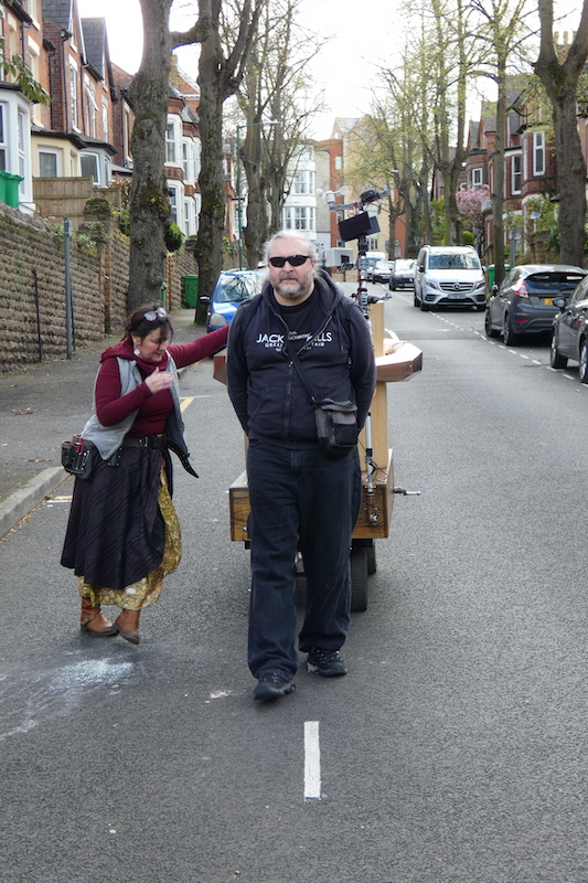 Dominic and Future Machine's companion pulling Future Machine down Douglas Road