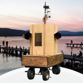 Future Machine with the jetties on Lake Windermere at sunset