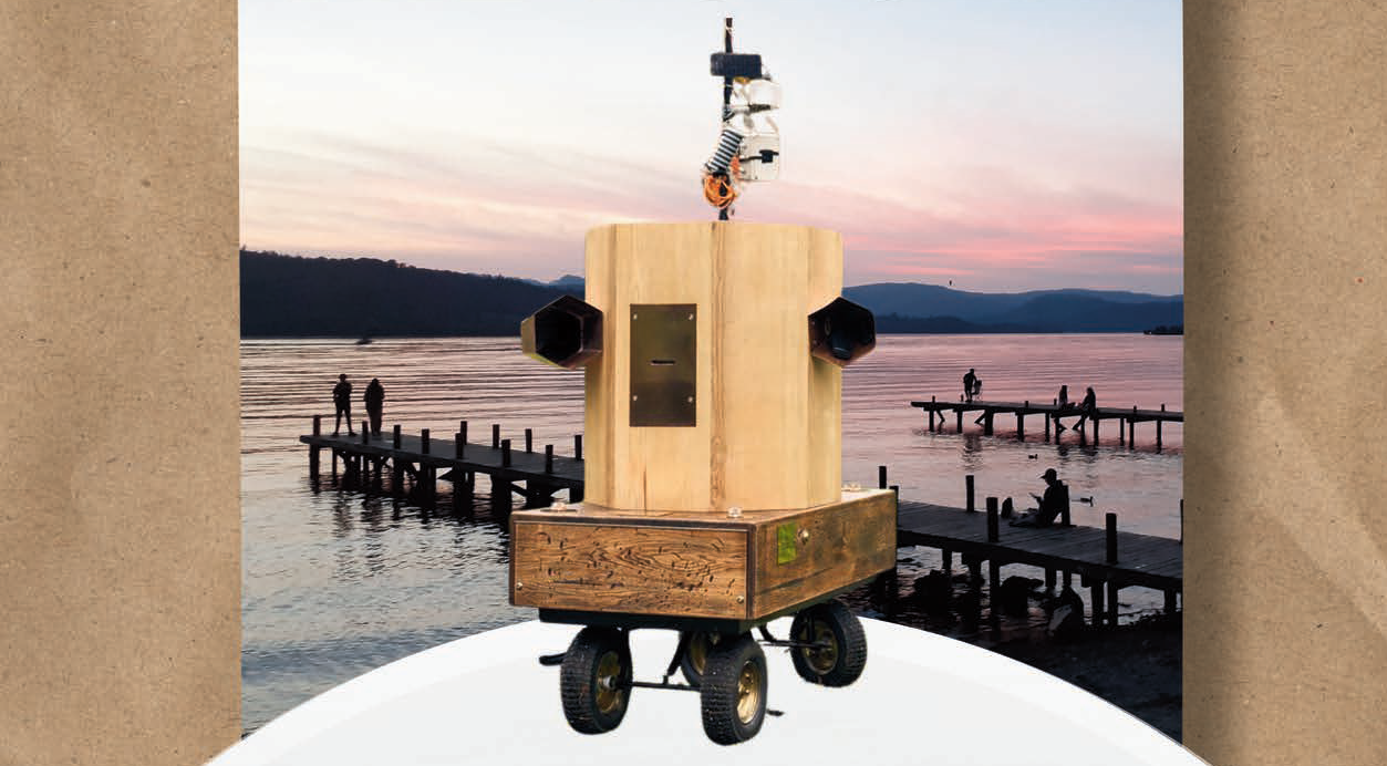 Future Machine with the jetties on Lake Windermere at sunset